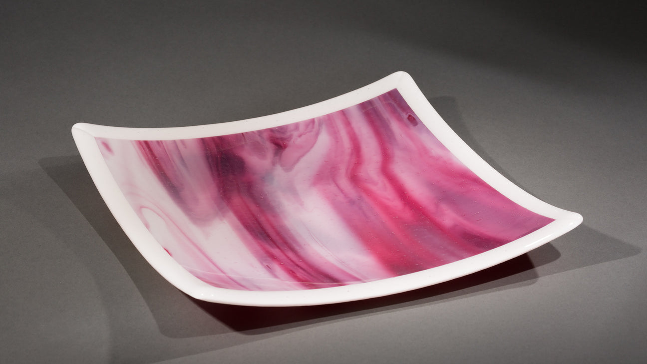 Pink and white glass plate
