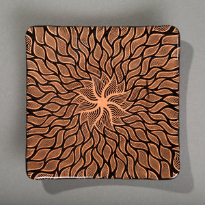 Copper and black glass sunswimmer plate
