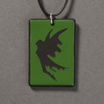 Sandcarved green and black glass fairy pendant.
