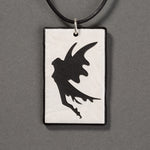 Sandcarved silver pearl and black glass fairy pendant.
