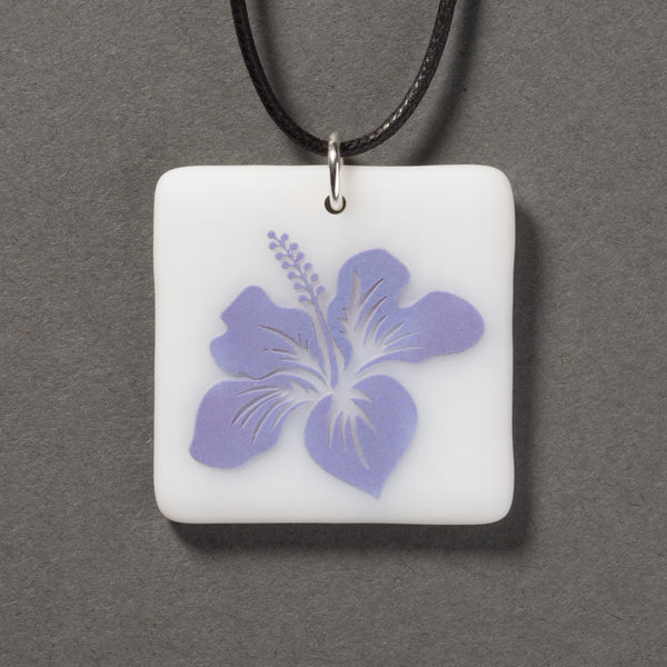 Sandcarved amethyst and white glass hibiscus flower pendant.