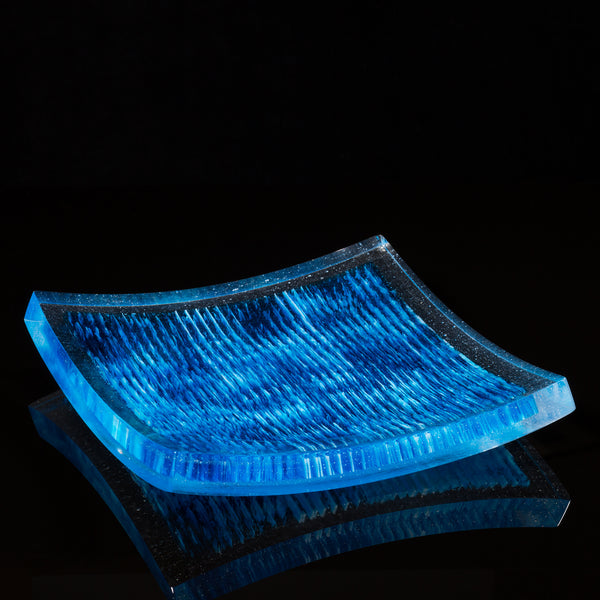 Cut and polished turquoise, white, and clear fused glass ice cube platter.