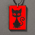 Sandcarved red and black glass kitty pendant.