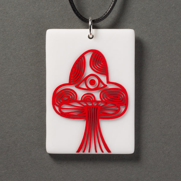 Sandcarved red and white glass mushroom pendant.