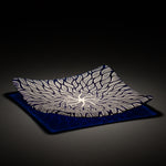 Sandcarved silver pearl and caribbean blue glass sun swimmer plate.