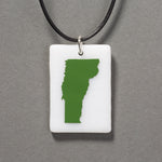 Sandcarved green and white glass vermont pendant.