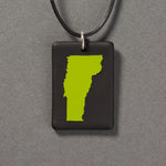 Sandcarved lime green and black glass vermont pendant.