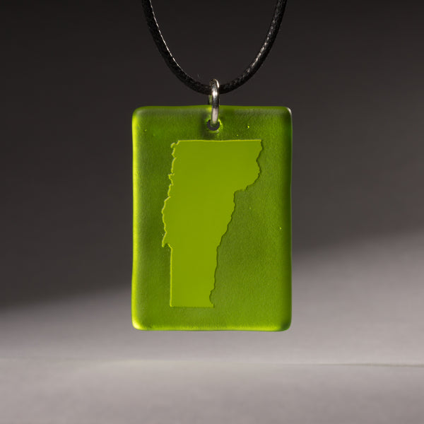Sandcarved lime green and green transparent glass vermont pendant.
