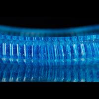 Cut and polished turquoise, white, and clear fused glass ice cube platter.