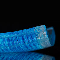 Cut and polished turquoise, white, and clear fused glass ice cube platter.