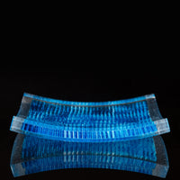 Cut and polished turquoise, white, and clear fused glass ice cube platter.