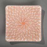 Sandcarved copper and white glass sun swimmer plate.