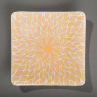 Sandcarved gold and white glass sun swimmer plate.