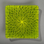 Sandcarved lime green and green transparent glass sun swimmer plate.