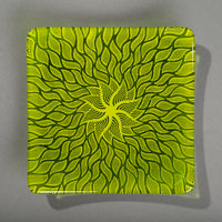 Sandcarved lime green and green transparent glass sun swimmer plate.