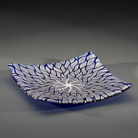 Sandcarved silver pearl and caribbean blue glass sun swimmer plate.